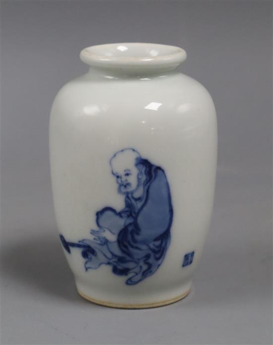 A Chinese small blue and white vase painted with a luohan H.10cm